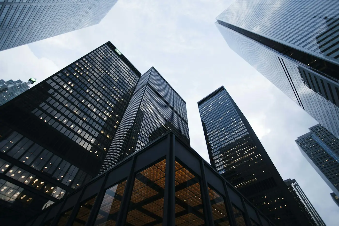 Tall glass buildings seen from street level